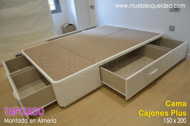 Cama con seis cajones retranqueados de medida 150x200 modelo Plus tapizada en polipiel, tiradores y zócalo color blanco montada en Almería