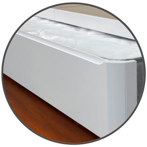 Detalle del nuevo tirador Perfilado en cama nido con acabado en madera de Qué Idea Hogar