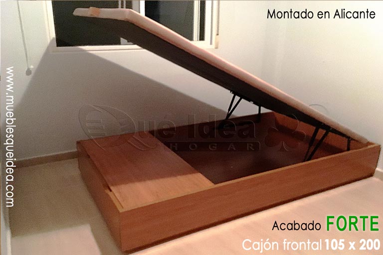 Montaje realizado en Alicante de un Canapé individual de tapa abatible con pie para almacenaje en un cajón con acabado en madera color cerezo